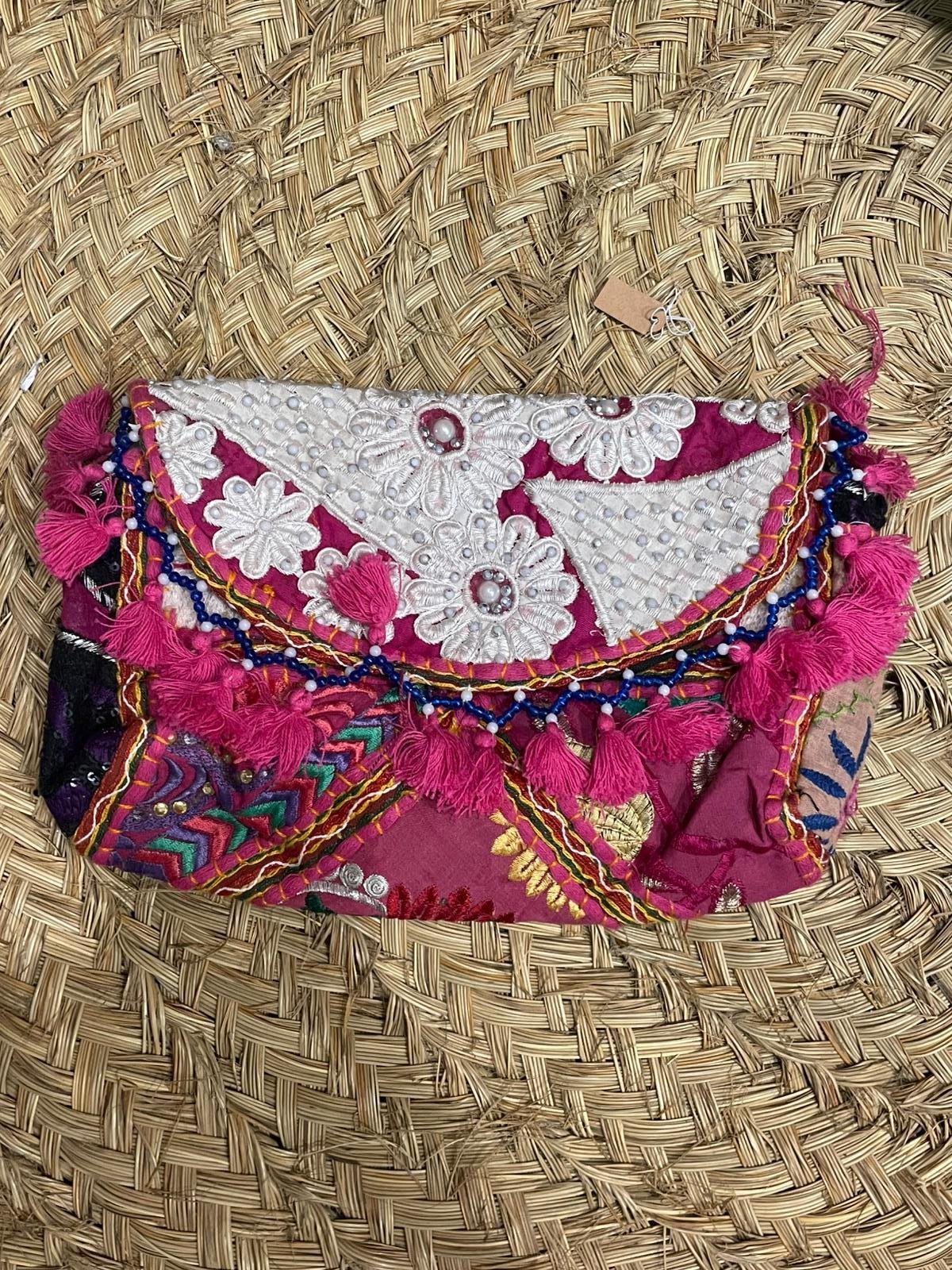 BOLSO DE MANO ROSA